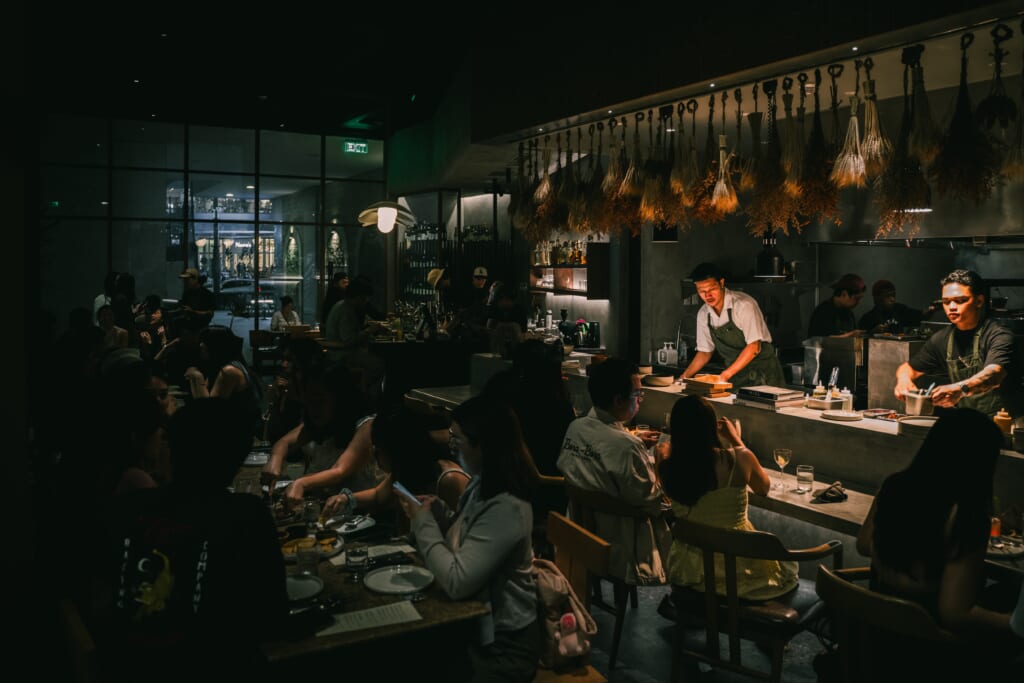 Kitchen team at Los Tacos MNL working the line during service